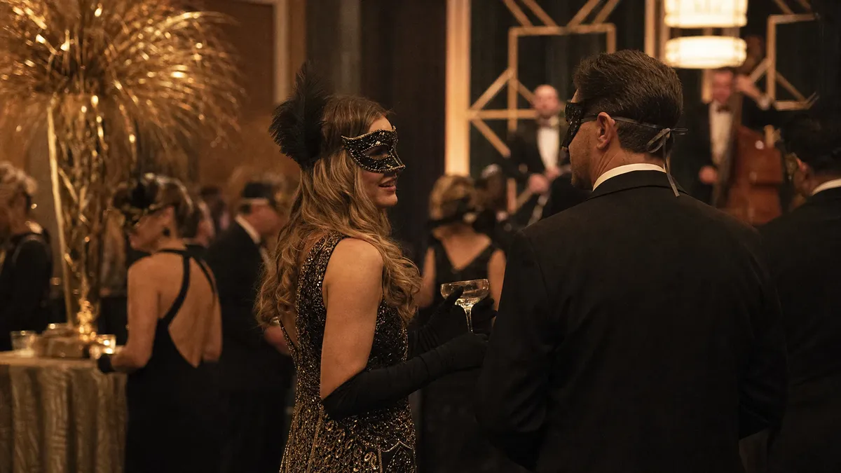 Gatsby-themed corporate holiday gala with guests in elegant attire