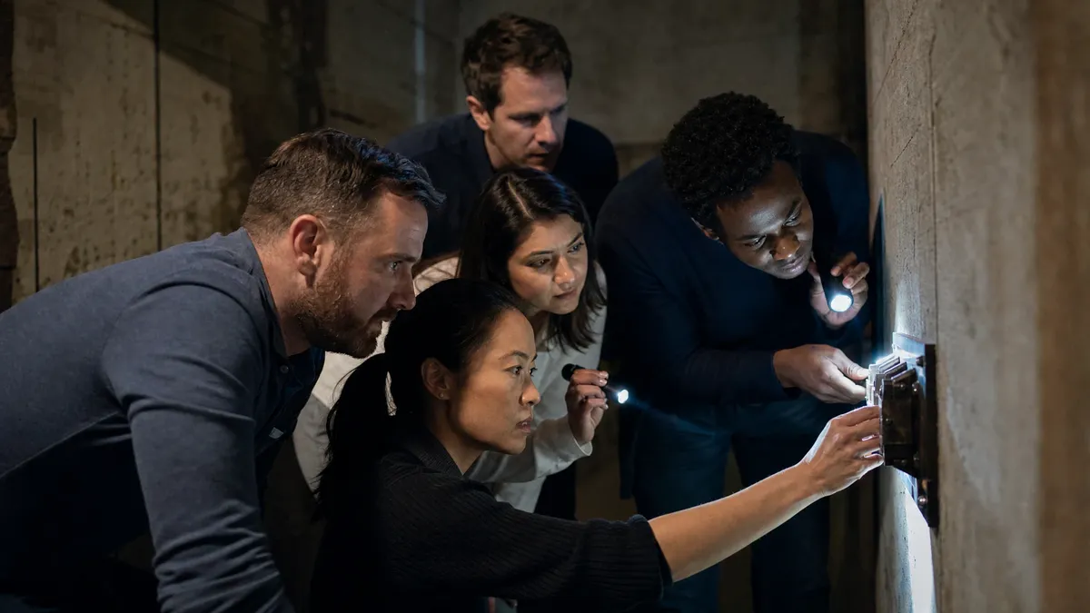 Escape Room Team Building: How to Run One Your Team Actually Talks About After