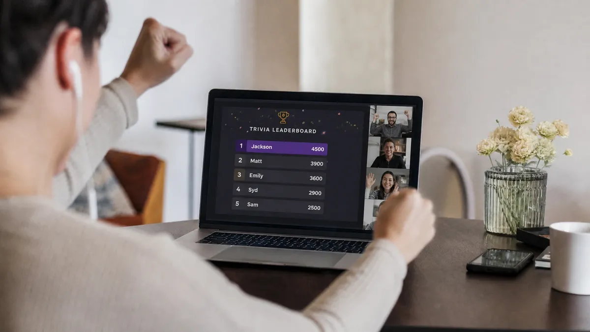 Virtual trivia leaderboard on a laptop during a team video call