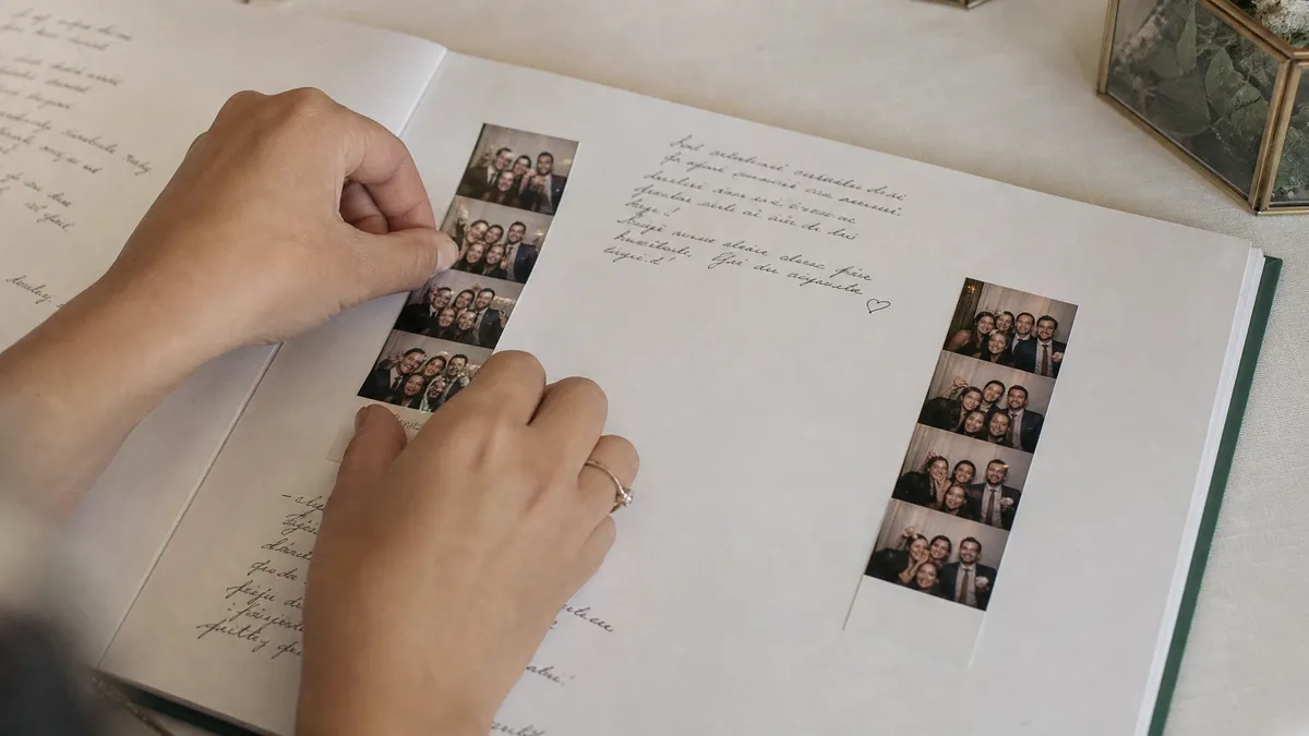 Wedding guestbook page with photo strips glued beside handwritten notes