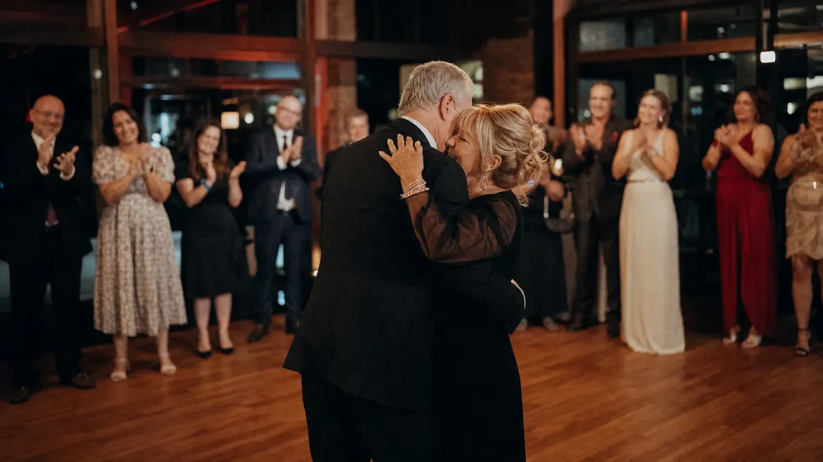 Anniversary dance moment with the last couple standing to applause