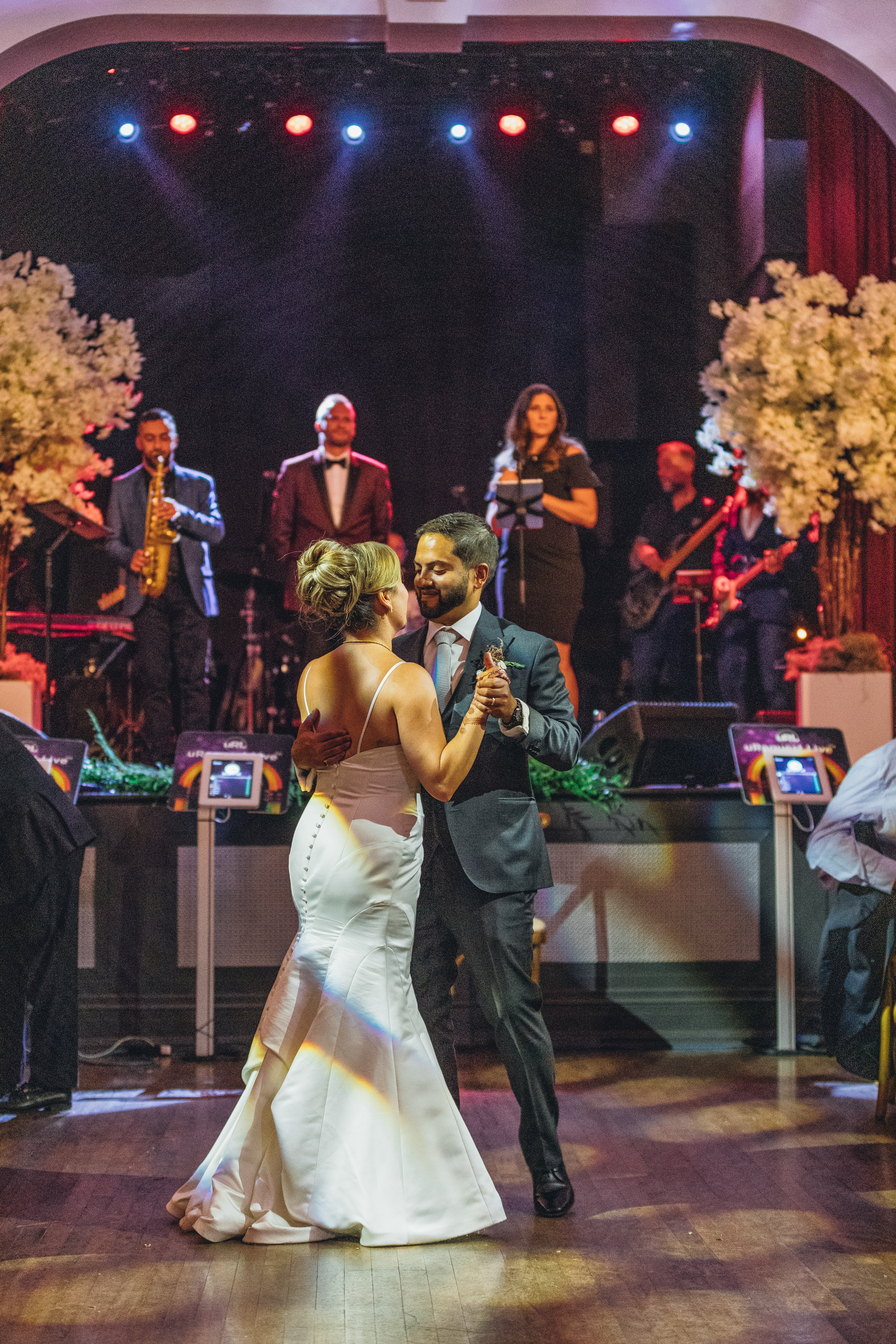 A joyful wedding moment captured with a couple celebrating, showcasing Fusion Events' ability to create unforgettable experiences